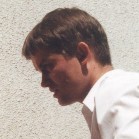 Andrzej Galla (wicedyrektor, geograf) zdejmuje tabliczk� starej szko�y z budynku Raszy�skiej